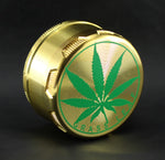 goldener Grinder mit Hanfblatt